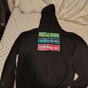 adidas Triple Colorblock Trefoil Strips in Red, Teal, Yellow